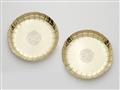 A pair of George I silver gilt strawberry dishes - image-1