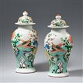 A pair of lidded famille verte baluster vases. Qing dynasty, 19th century - image-1