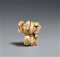 An ivory netsuke of a sanbasô dancer with mask and eboshi. 19th century - image-1