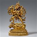 A Tibetan fire-gilt bronze figure of Chakrasamvara and Vajravarahi in yab-yum. 18th/19th century - image-1