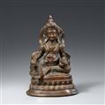 A Tibetan bronze figure of Jambhala. 19th/20th century - image-1