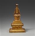 A Tibetan fire-gilt bronze bumpa-stupa. 18th century or later - image-2