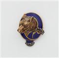 A Victorian 18k gold enamel ruby and diamond hunting brooch with head of a wolf. - image-1