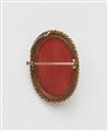 A 14k gold and Mediterranean red coral cameo brooch. - image-2