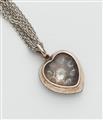 A Victorian silver 14k red gold and diamond heart locket with attached 14k white gold chain. - image-2