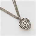 A Victorian silver 14k red gold and diamond heart locket with attached 14k white gold chain. - image-1