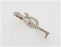 A platinum 18kt gold and diamond Belle Epoque bangle. - image-1