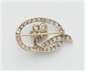 A platinum 18k gold and diamond Belle Epoque flower brooch. - image-2