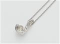An 18k white gold and diamond pendant with 14k gold chain. - image-2