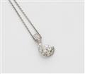 An 18k white gold and diamond pendant with 14k gold chain. - image-1