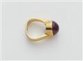 A German 18k gold and star ruby cabochon ring. - image-2