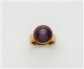 A German 18k gold and star ruby cabochon ring. - image-1