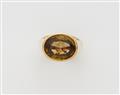 A German 18 kt gold and brown circon ring. - image-1