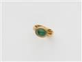 A German emerald cabochon ring. - image-1