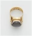 An 18k gold and grey moonstone ring by Wilhelm Nagel, Cologne - image-3