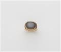 An 18k gold and grey moonstone ring by Wilhelm Nagel, Cologne - image-1