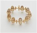 A German 18k gold and rutile quartz designer bracelet. - image-1