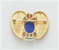 A German one of a kind 18k gold lapis lazuli carnelion and turquoise winged scarab brooch inspired by the famous amulet of Tutankhamun. - image-2