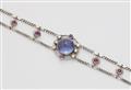 A German 18k white gold tanzanite ruby and diamond bracelet. - image-2