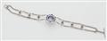 A German 18k white gold tanzanite ruby and diamond bracelet. - image-3