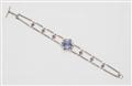 A German 18k white gold tanzanite ruby and diamond bracelet. - image-1