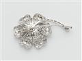 A platinum and diamond clover brooch with a treated lemon coloured brilliant-cut centre stone c. 1.30 ct. - image-2