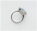 An 18k white gold aquamarine and diamond ring. - image-2