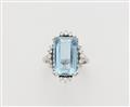 An 18k white gold aquamarine and diamond ring. - image-1