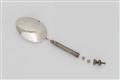 A silver spoon with screw mounted compartment - image-1