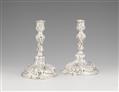 A pair of Magdeburg Rococo silver candlesticks - image-1