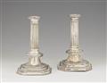 A pair of Queen Anne silver candlesticks - image-1