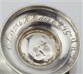 A George I silver hot milk jug - image-3