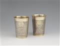 Two Transylvanian parcel gilt silver beakers - image-1