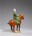 A sancai-glazed figure of a horse and rider. Tang dynasty (618-907) - image-2