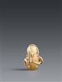 An ivory netsuke of an octopus trapped in a pot. Mid-19th century - image-1