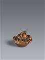 A very fine boxwood netsuke of an octopus in a suribachi. 19th century - image-1