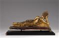 An Ayutthaya gilded and lacquered bronze figure of a reclining Buddha. Thailand. 18th/19th century - image-2