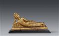 An Ayutthaya gilded and lacquered bronze figure of a reclining Buddha. Thailand. 18th/19th century - image-1