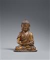 A small gilded and lacquered bronze figure of Buddha Shakyamuni. Ming dynasty, 16th century - image-1