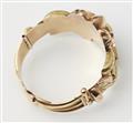 A Tunesian 18k bicolour gold repoussé Retro Style bangle. - image-2