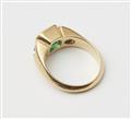 A German 18k gold diamond and Columbian emerald three stone ring. - image-2