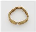 A flexible 18k gold meshwork bracelet with diamond strip. - image-1