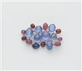 A German 18k white gold Ceylon sapphire and ruby cabochon brooch. - image-1