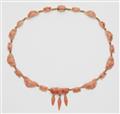 An Archaeological Revival style 18k gold and Sciacca coral cameo necklace. - image-1