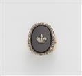 An 18k gold onyx and jewelled crown ring. - image-1