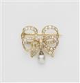 A 14k gold and European old-cut diamond bow brooch with pearl droplet. - image-1