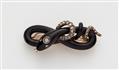 A late 19th century 14k gold black enamel and diamond snake brooch. - image-1