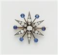 A French Belle Epoque silver 18k gold diamond and sapphire star brooch with detachable mount. - image-1