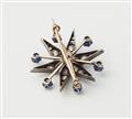 A French Belle Epoque silver 18k gold diamond and sapphire star brooch with detachable mount. - image-3