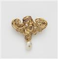 A French Art Nouveau 18k gold, diamond ruby and pearl pendant brooch. - image-1